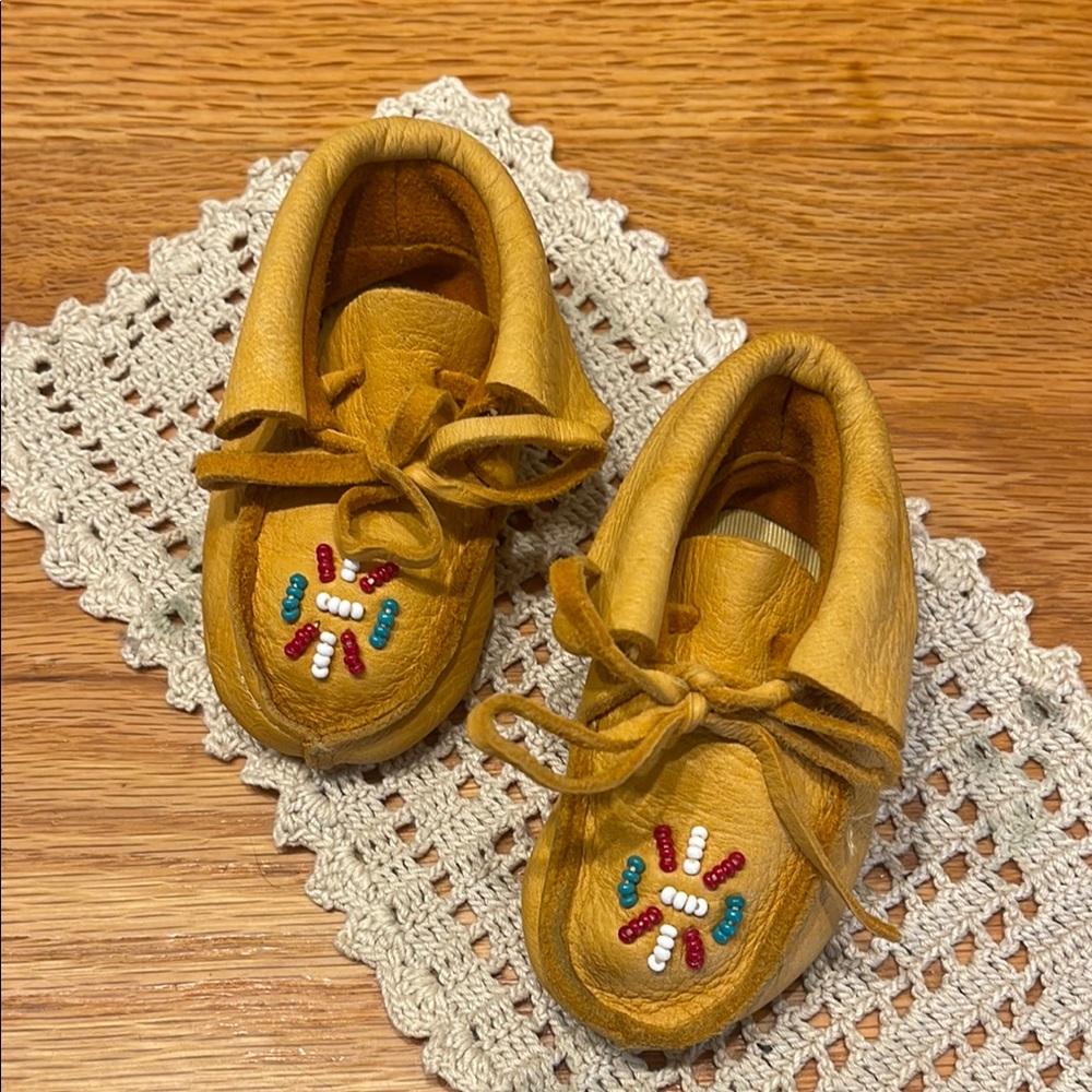Vintage infant Moccasin Shoes with Soft Suede Material and Charming Design